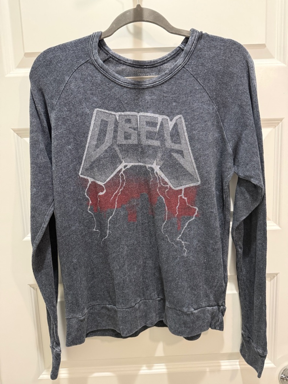 Obey Washed Black Crewneck Sweatshirt with Red Graphic